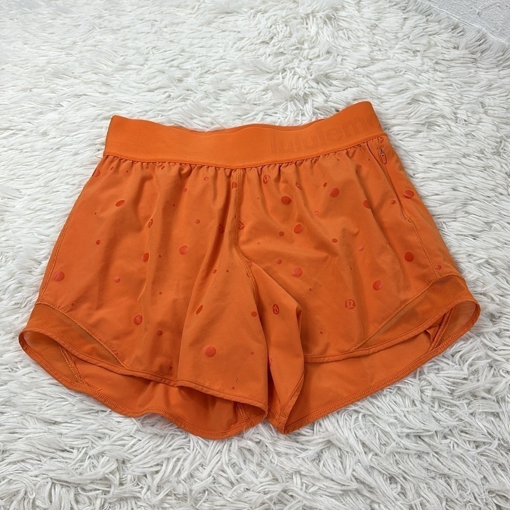Lululemon Hotty Hot Short 4" *Logo Poco Logo Foil Amber Orange